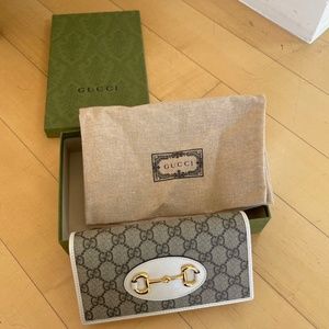 NIB Gucci Wallet on the chain.